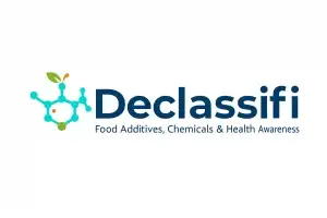 Create a clean, professional logo for the brand "Declassifi". Use the existing design elements: a teal-blue molecular structure icon with a small green leaf on top, and the word “Declassifi” written in bold dark blue modern sans-serif font. Place the molecular icon on the **left side** of the word “Declassifi”, aligned horizontally with the text baseline. Below the brand name, add the tagline: “Food Additives, Chemicals & Health Awareness” in smaller, simple dark blue font. Use a white background. Maintain balance, spacing, and alignment for a professional scientific look.